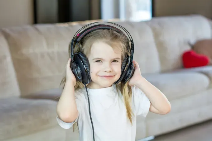 little girl listening to music