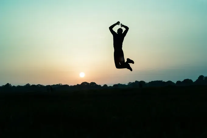 man jumping for joy