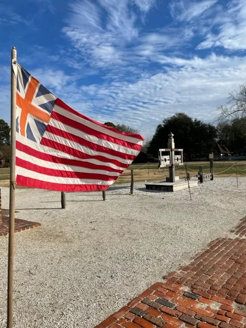 view of flag outside courthouse in Colonial Williamsburg Virginia