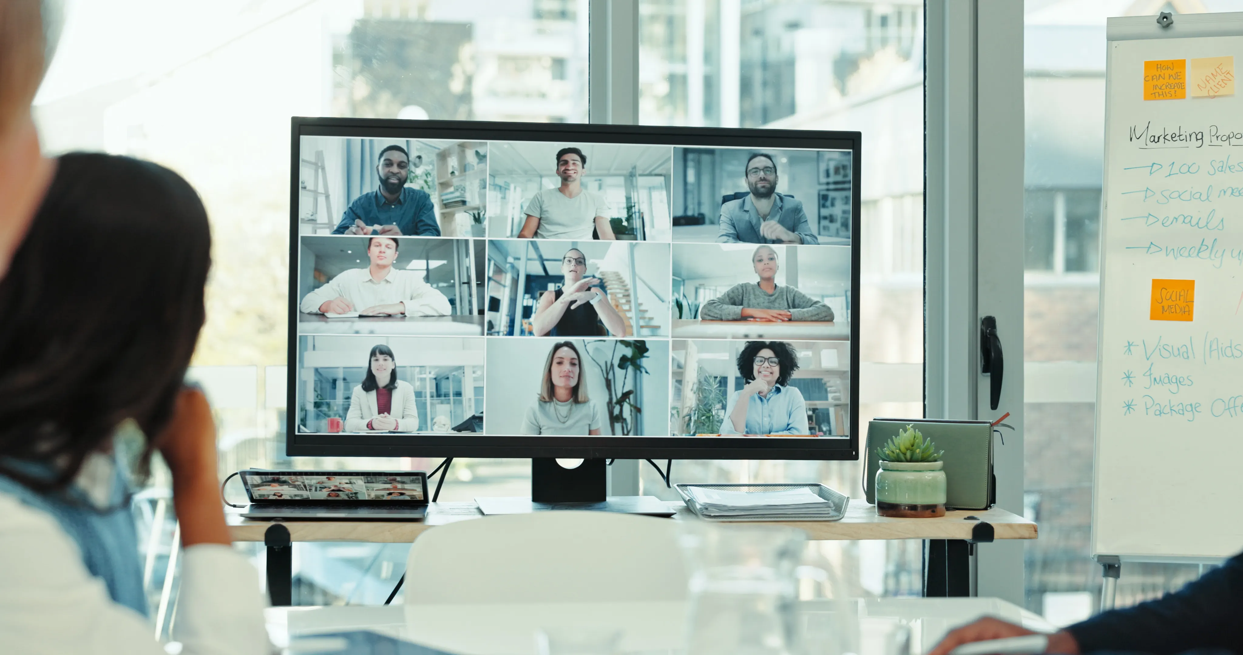 video call image showing a screen with attendees in a meeting
