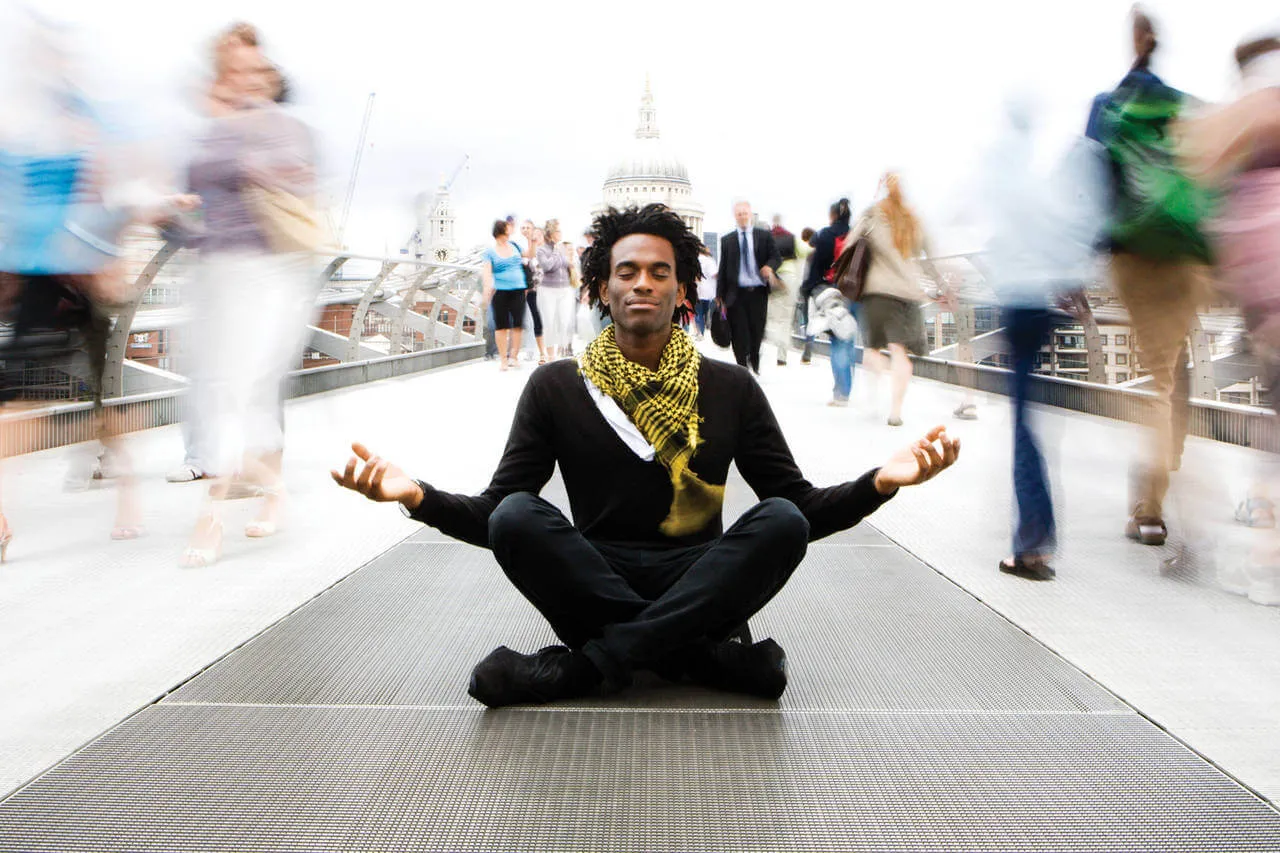 Meditating in crowd