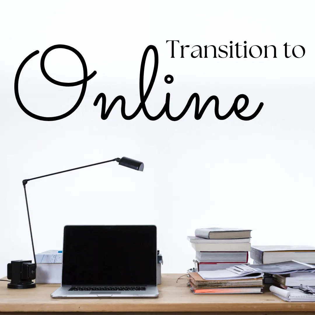 Minimalist workspace setup with the phrase 'Transition to Online' prominently displayed above. A laptop on a desk is flanked by a desk lamp and stacks of books and files, symbolizing the shift to online work or learning environments. The clean background provides a focused and clutter-free visual, suggestive of organized digital transition.