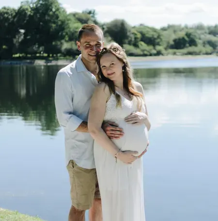 Happy couple by a lake