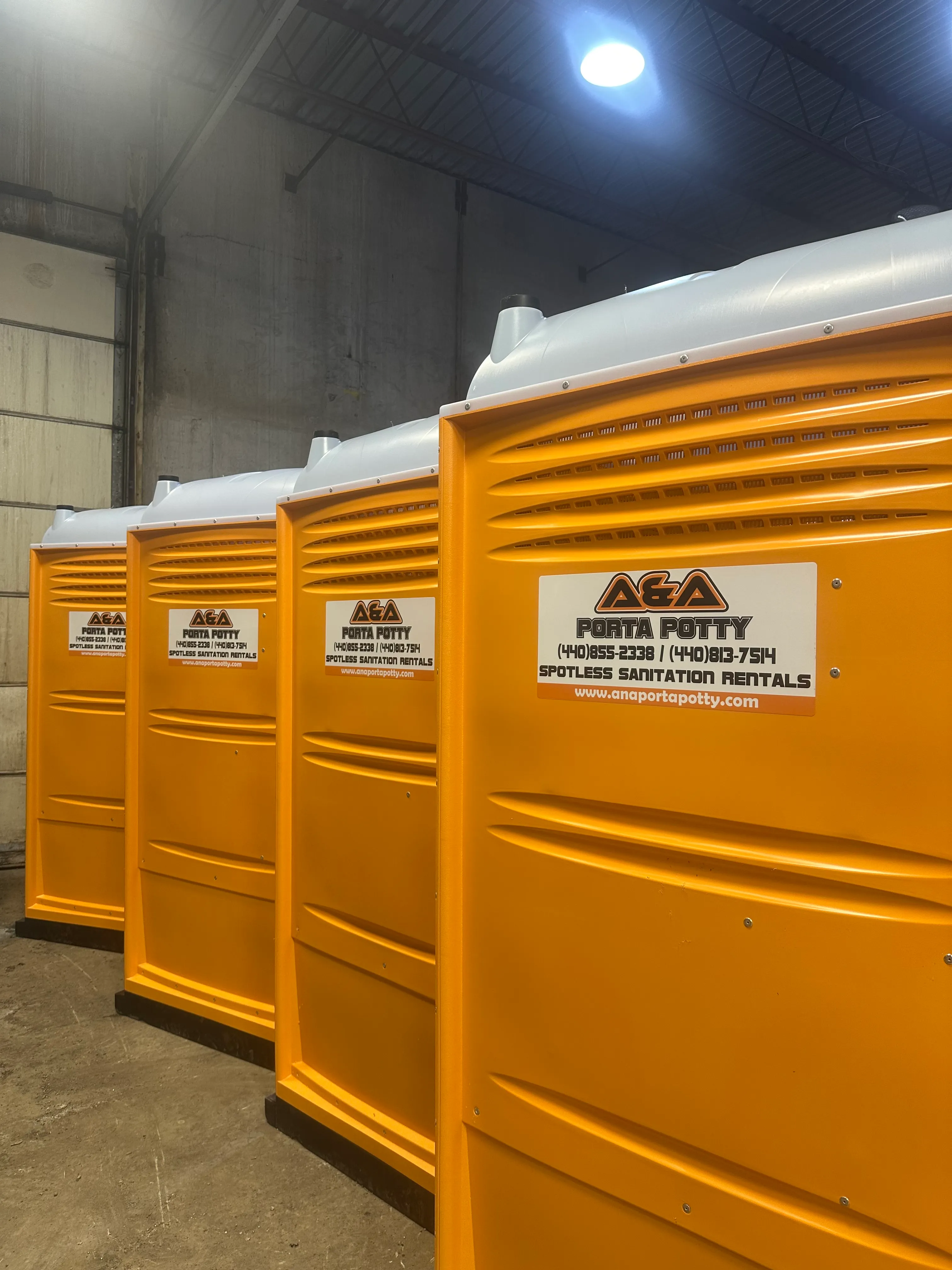Orange portable restrooms - AA Portapotty