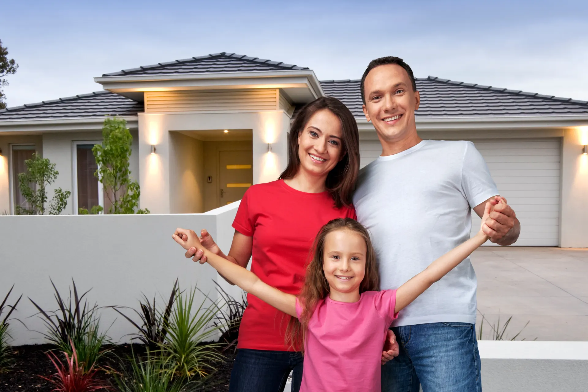Family happy with newly built home.