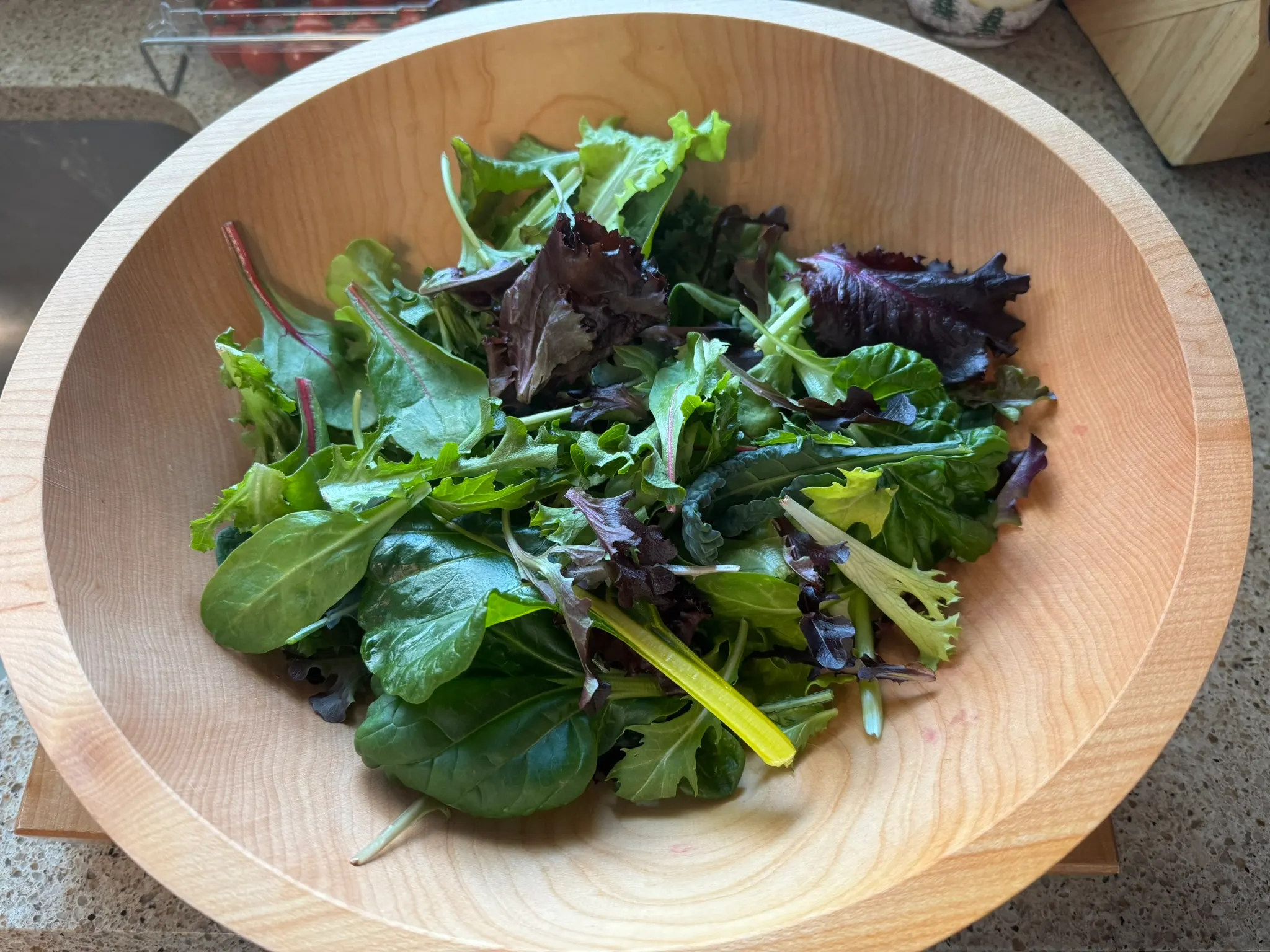 Abundant harvest of organic-quality greens and vegetables from Tower Garden, reducing grocery costs for home growers.