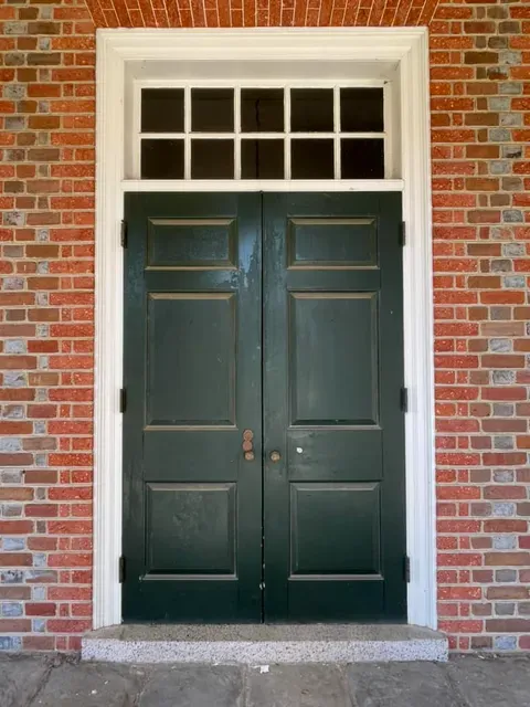 Doors to Hanover Courthouse where Patrick Henry practiced law as mentioned in Mark Counvillon's Patrick Henry's Virginia