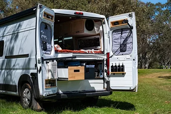 Rear garage storage access in self-built campervan