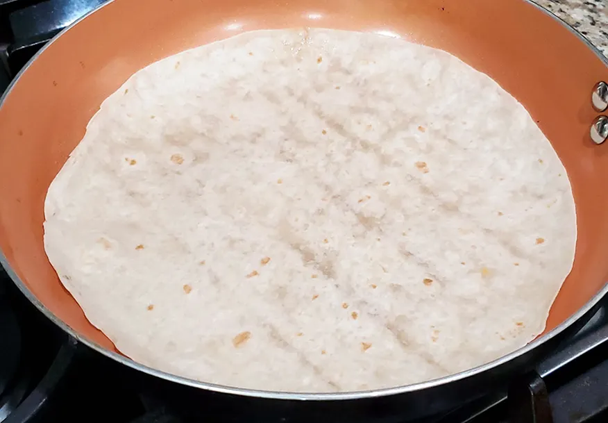 Add A Tortilla To The Frying Pan To Make Bart's Quick & So Delish 