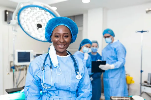 A African American anesthesiologist smiling