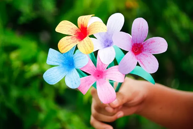 Hand holding flower bouquet