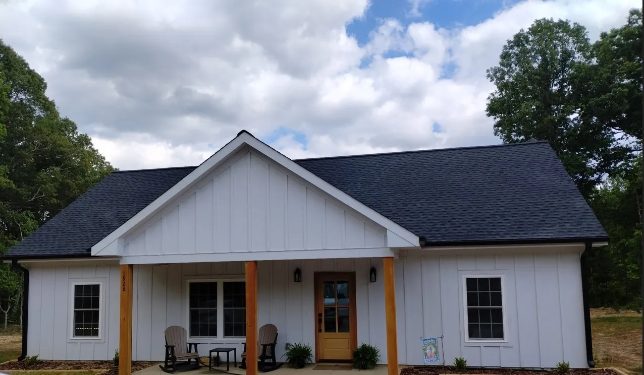 On-site seamless gutter fabrication and installation for a house in Badin, NC
