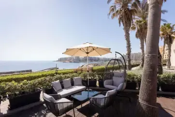 Hilton Malta Terrace seating overlooking Mediterranean