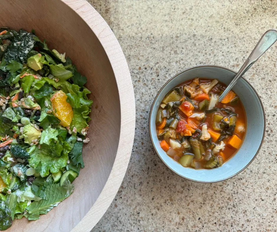 Citrus avocado winter salad served with a simple plant-based soup for a complete meal