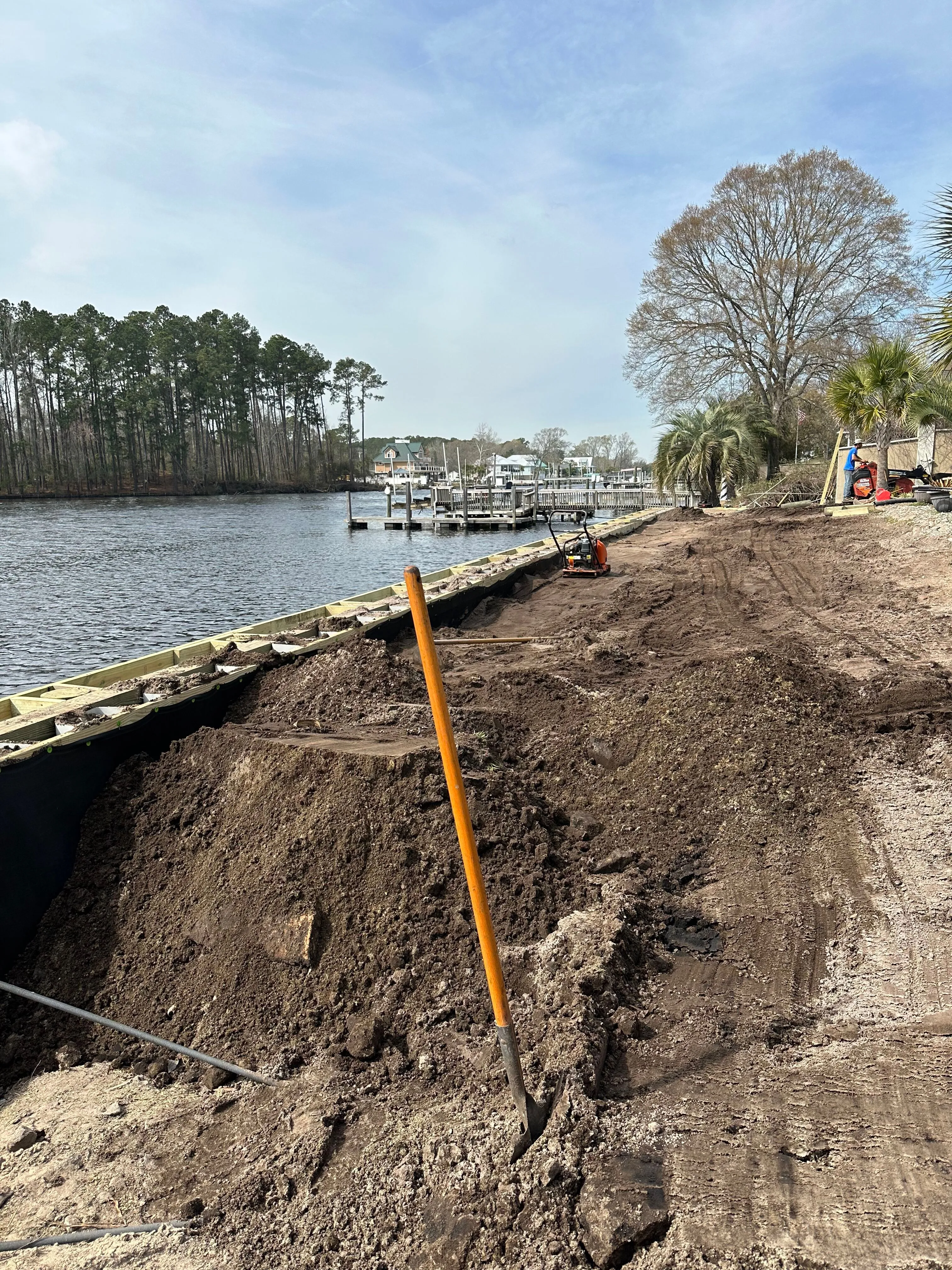 Vinyl Bulkhead with composite wood cap under construction in Myrtle Beach SC on the Intracoastal Waterway built by Waterbridge Contractors of the Carolinas