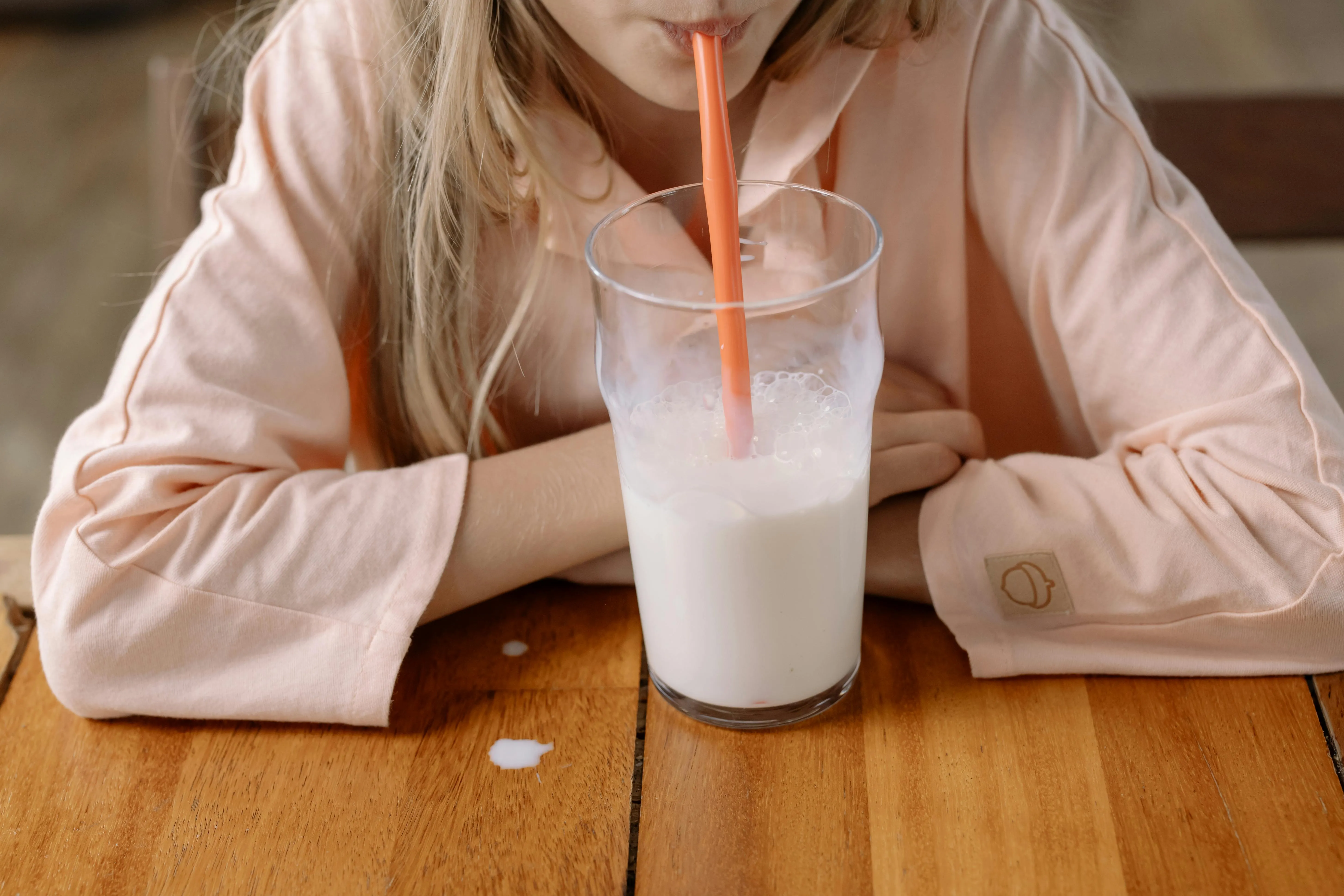 woman drinking glass of milk