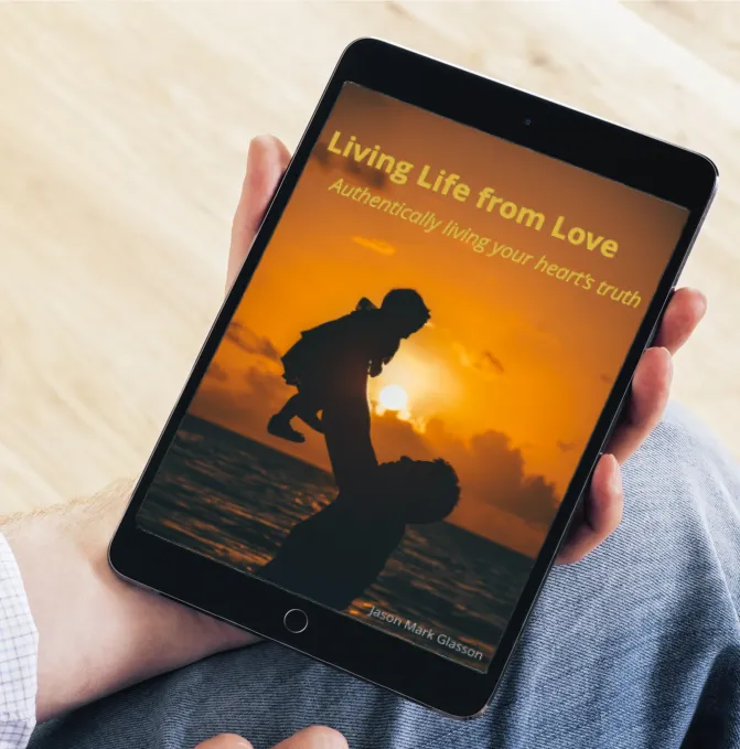 man holding ipad with ebook Living Life From Love
