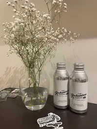 branded water bottle and fresh flowers at the Rochambeau Roadside Inn