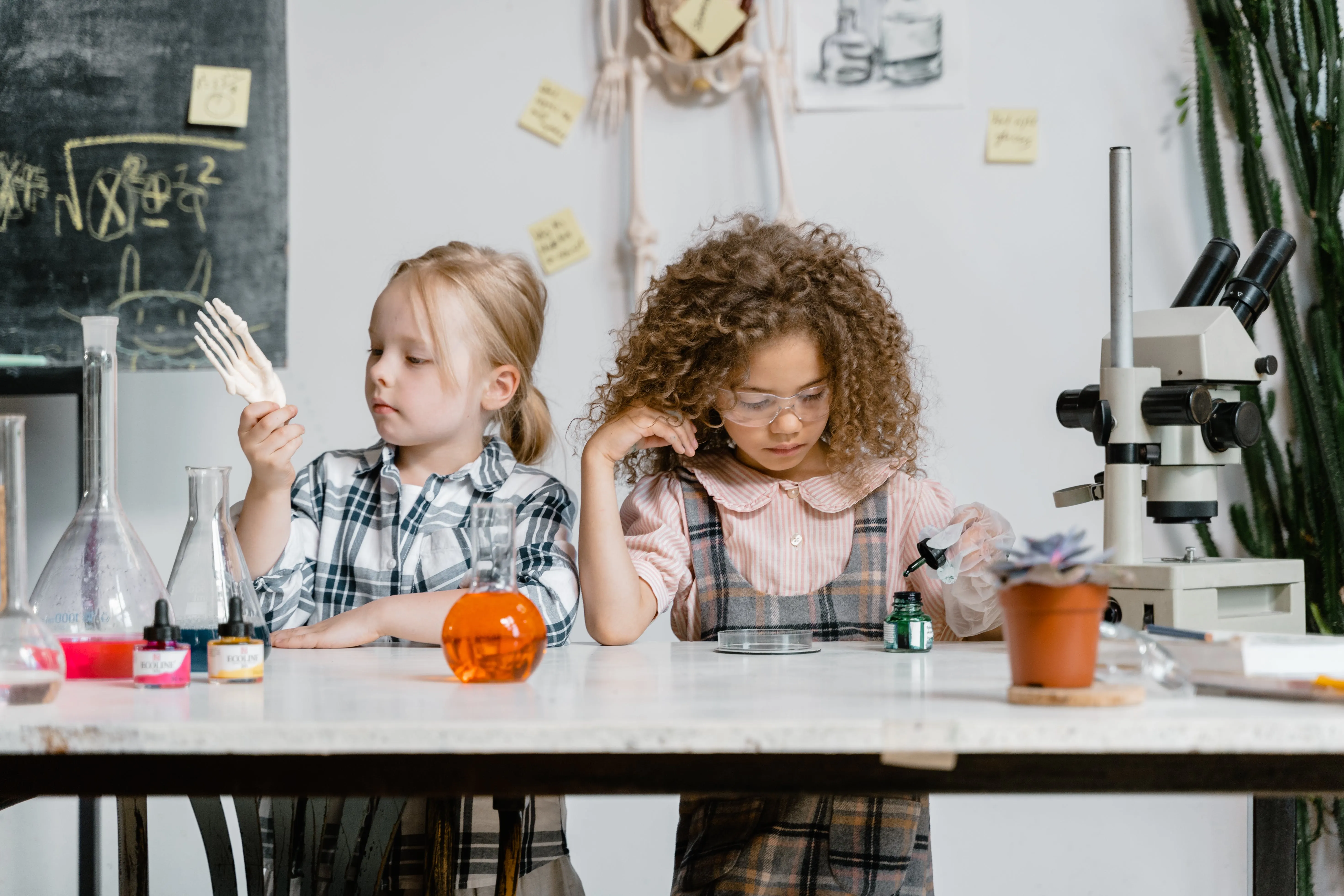 Girls Conducting a science experiment 