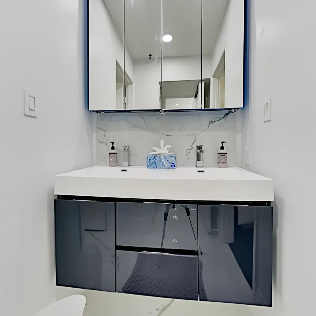 Enjoy the well-equipped bathroom with dual sinks, elevating your overall experience at our home.