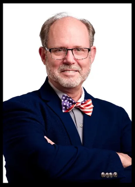 Dr Douglas Frank, has a PhD in physics