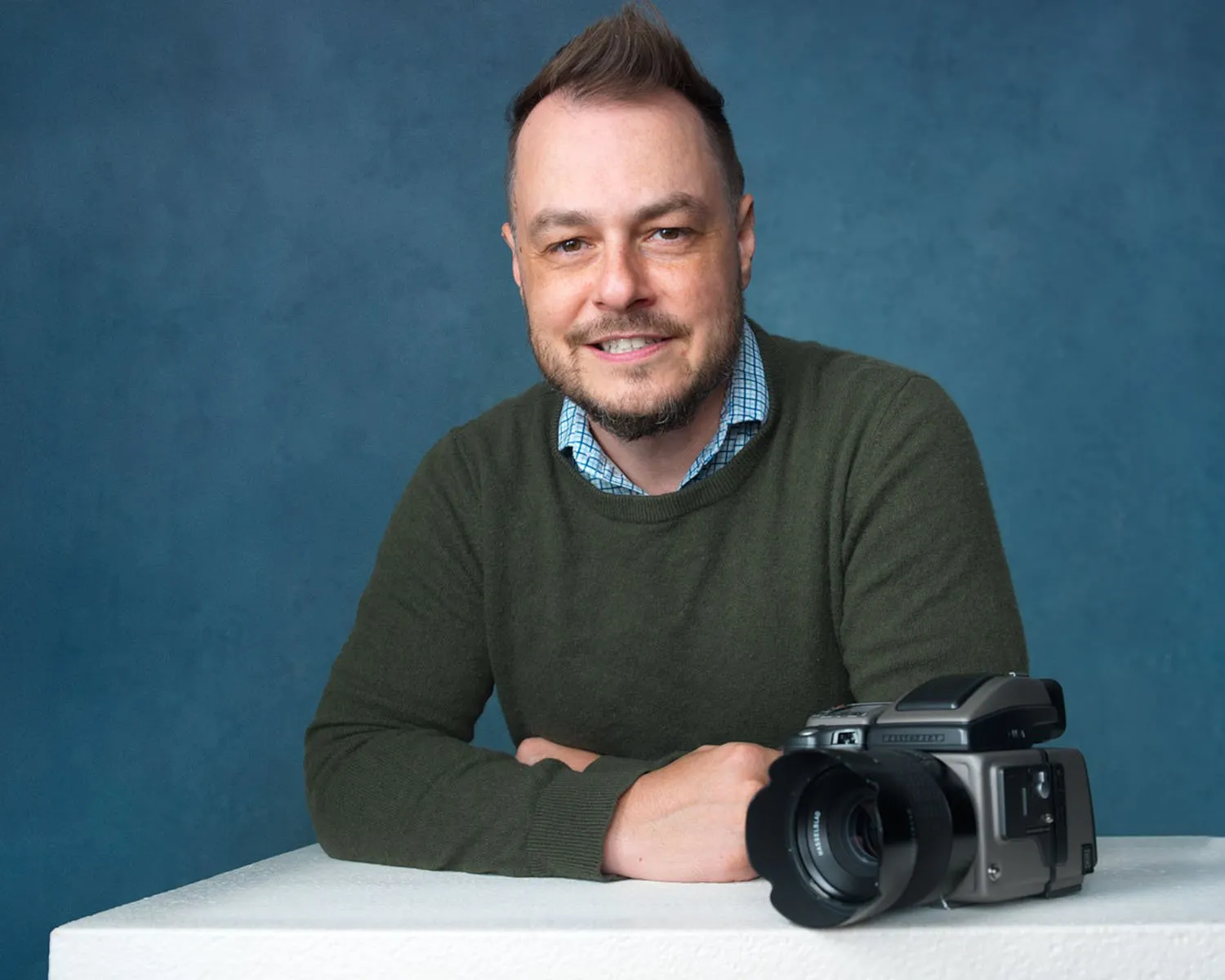 Professional headshot of Jared Wolfe, the CEO and lead photographer of Jared Wolfe Portraits