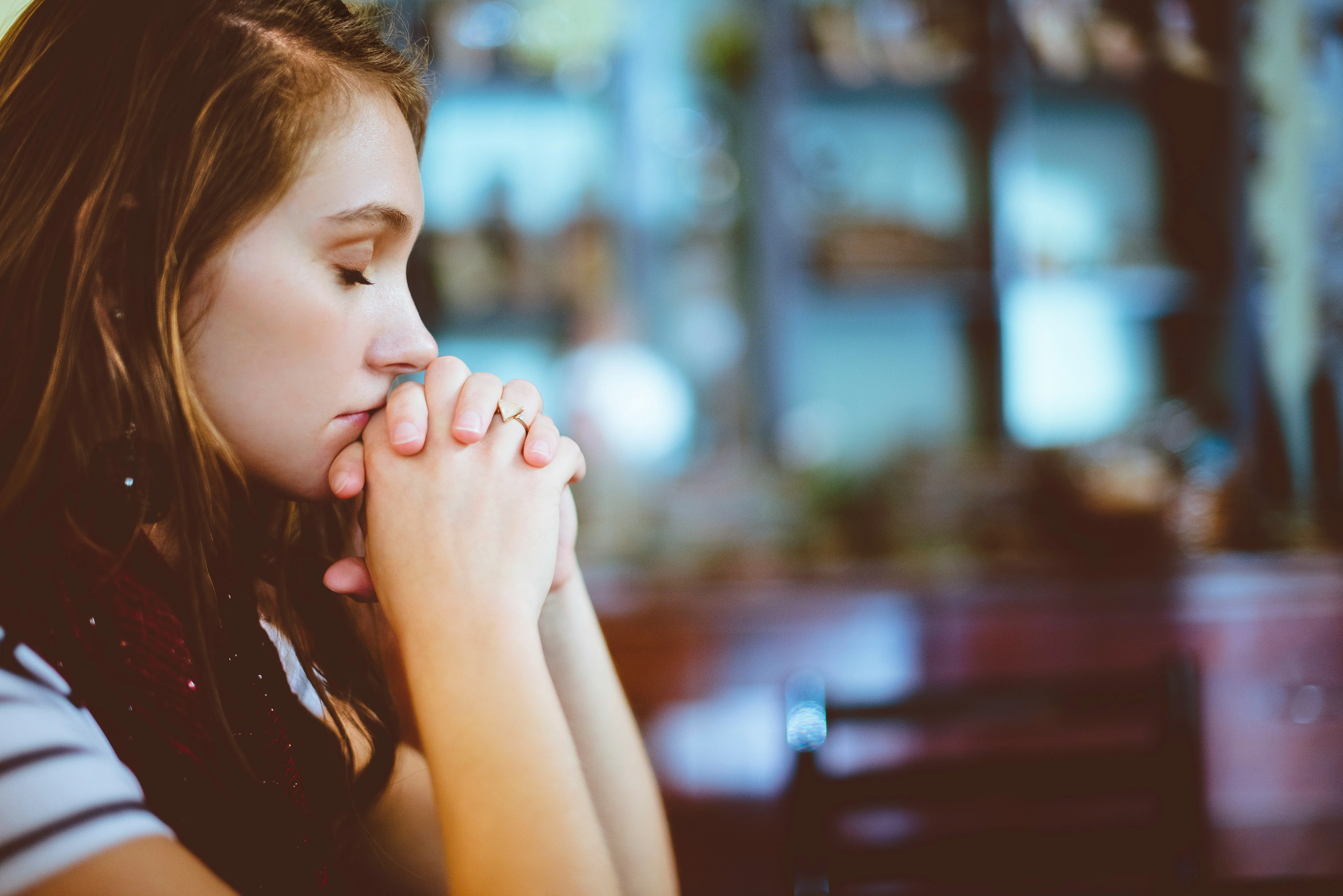 young woman in contemplation with eyes closed