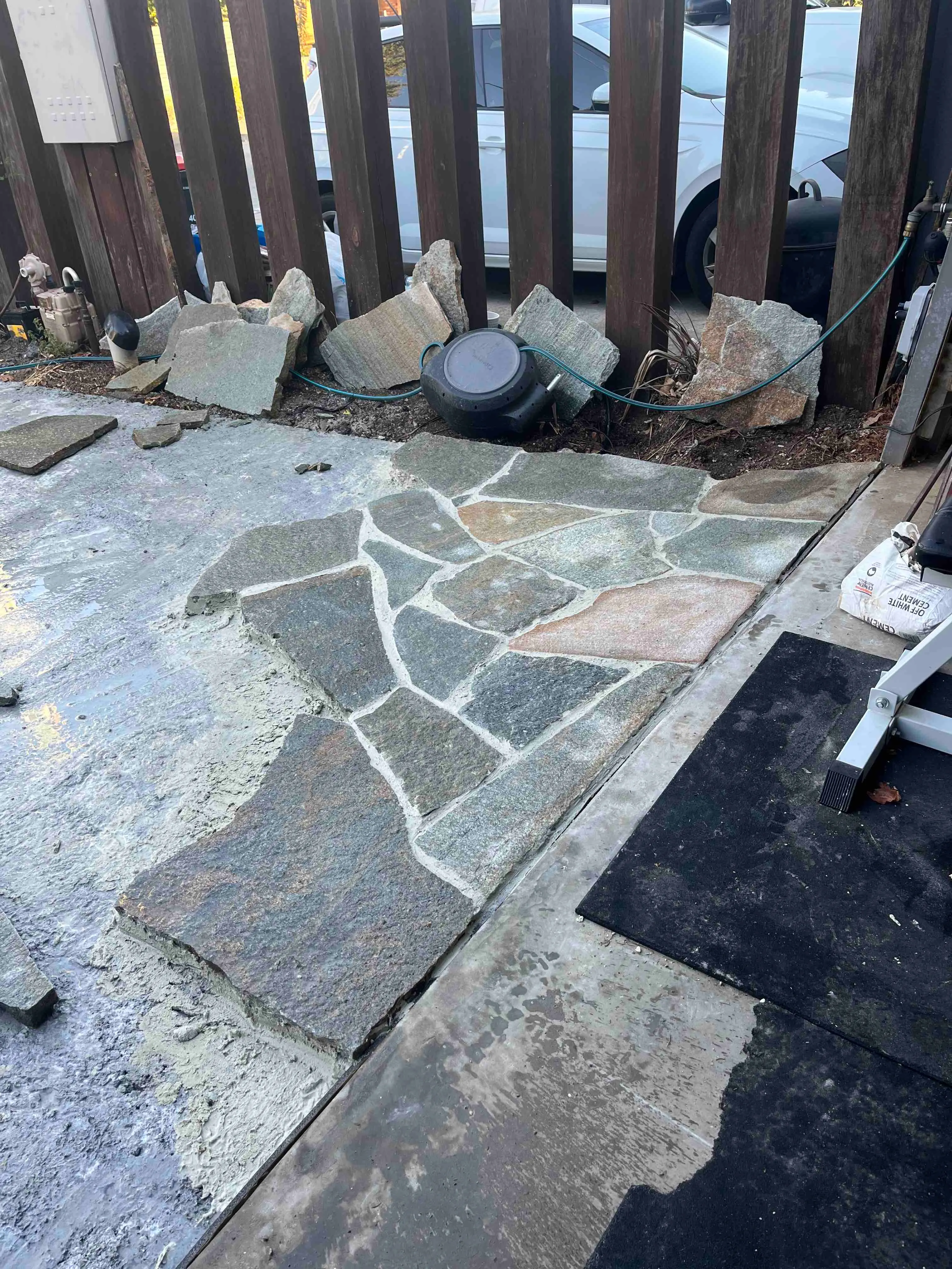 Rustic stone patio showcasing crazy paving style by Bryce Minett