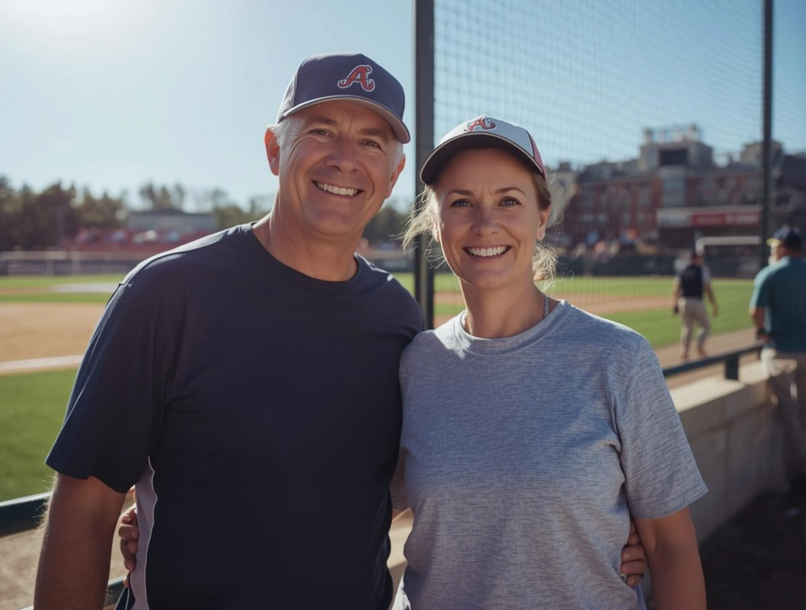 Parents of a high school baseball player at his game
