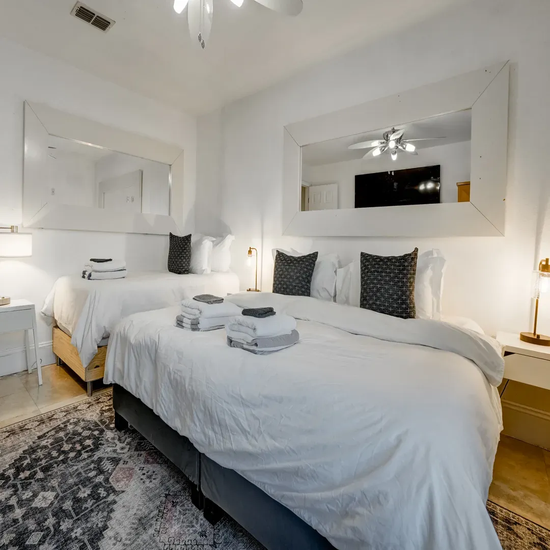 Comfortable Bedroom #6 with King or Twin bed options, plus an extra Twin bed and Smart TV