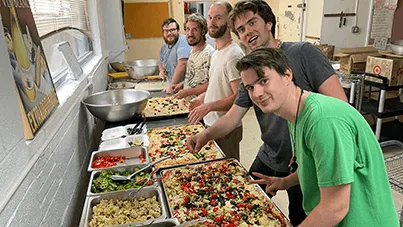 Serving together and making pizzas