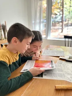 children using History Unboxed in a home-school setting